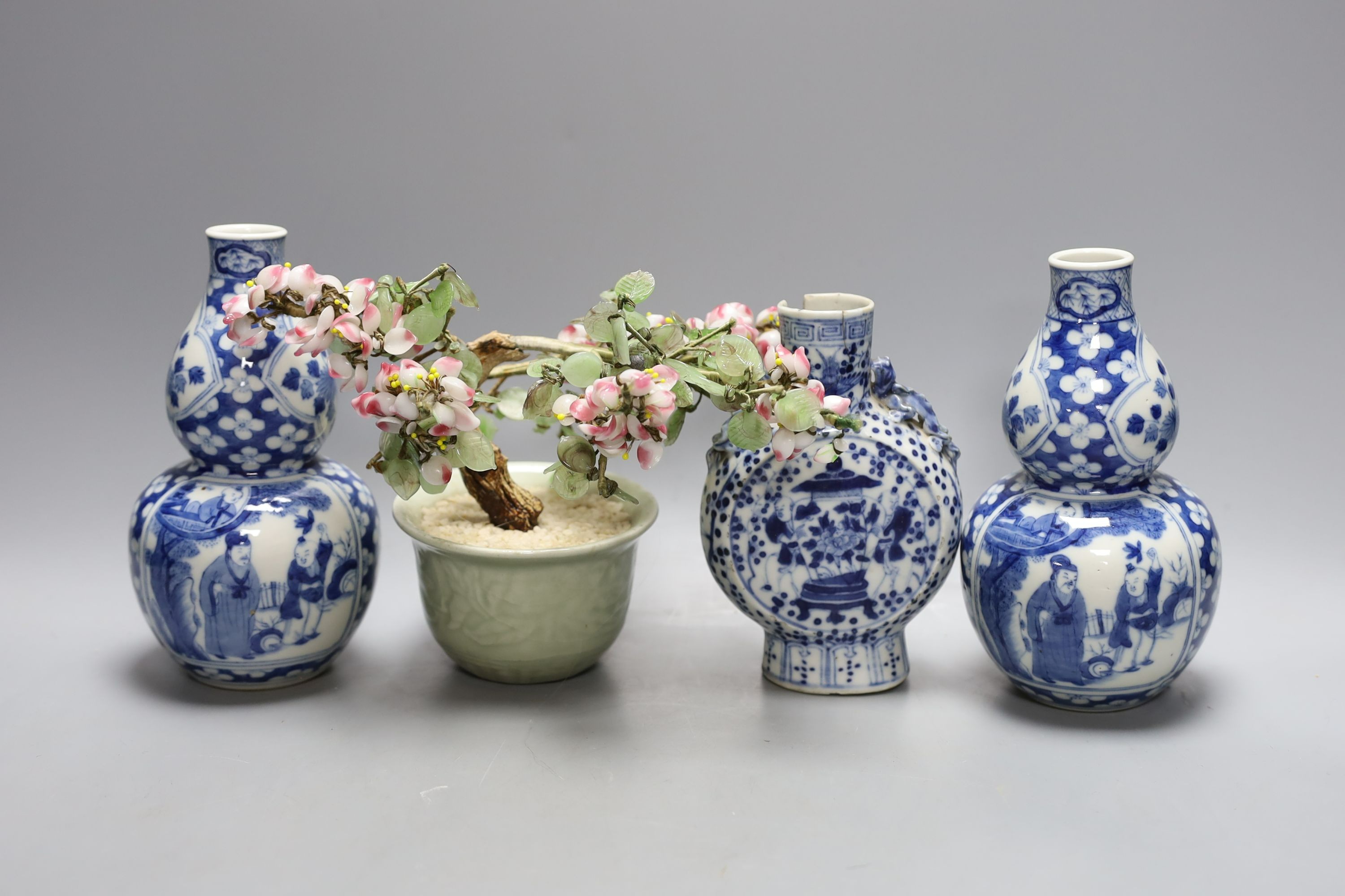 A pair of Chinese blue and white double gourd vases, similar moonflask and flower ornament 18cm